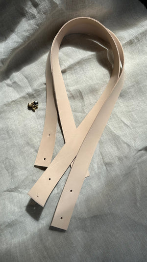 Natural leather handles with holes, perfect for DIY projects. Includes brass hardware