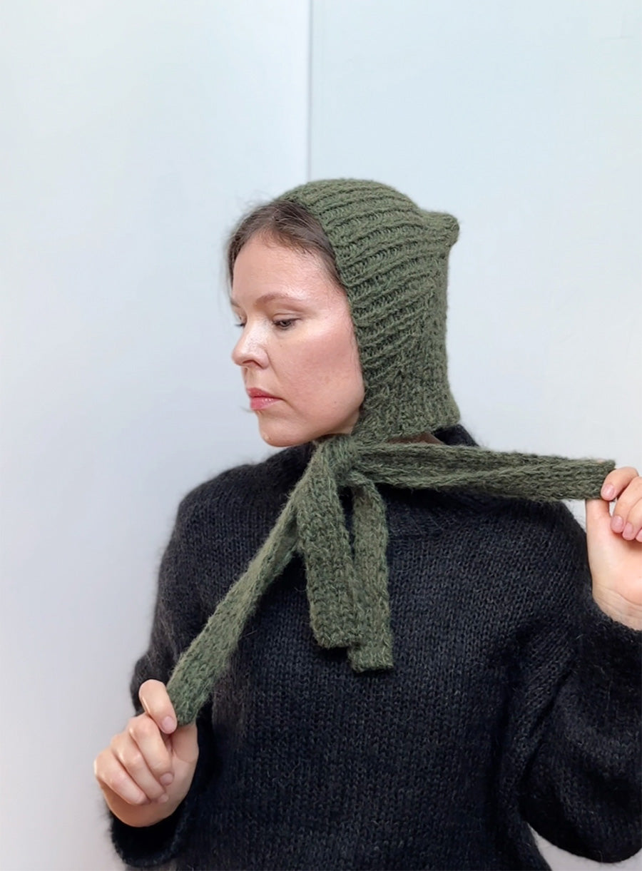 Handmade mohair knitted bonnet in vintage green, soft and warm winter hat with ties, cozy and stylish accessory for women, perfect handmade gift and cold weather fashion essential.