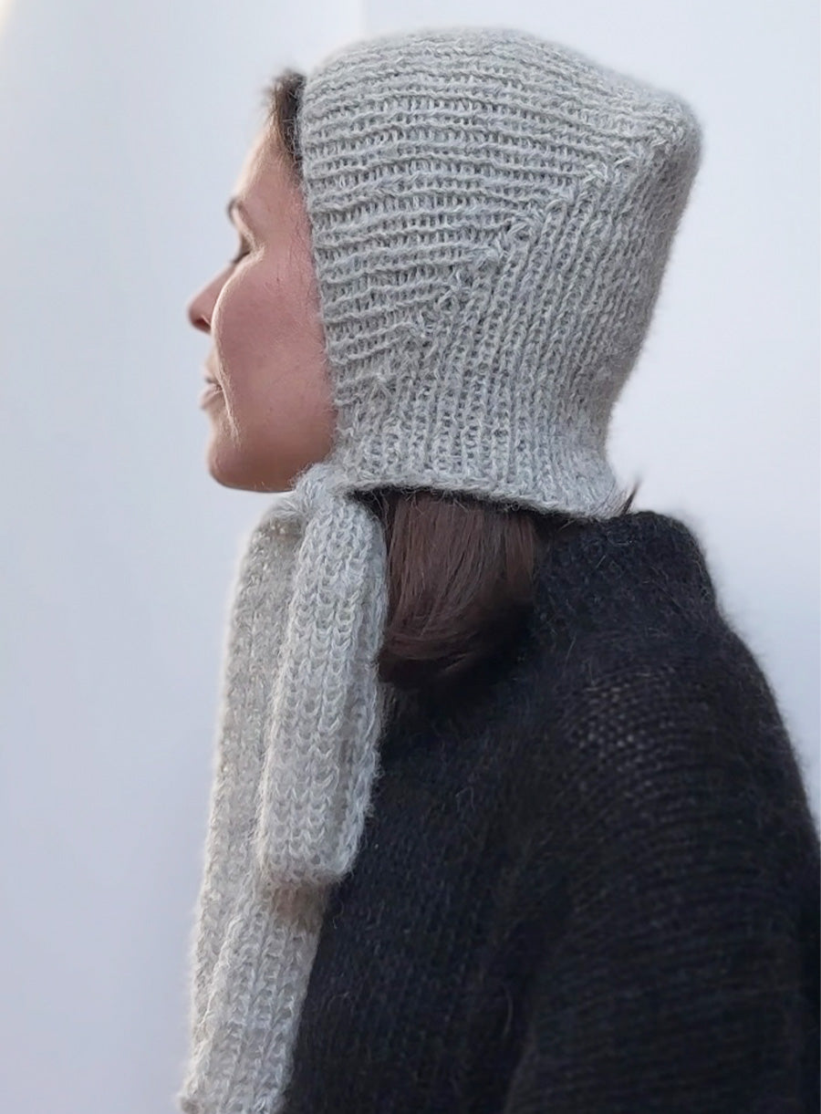 white fluffy hat